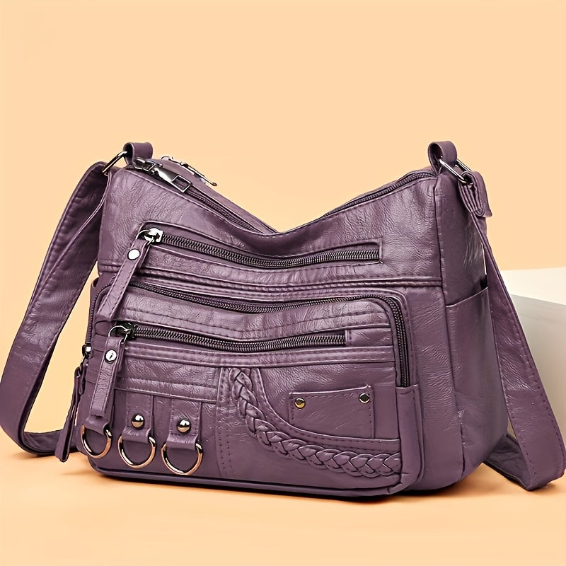 Purple: Multi-pocket quilted PU shoulder bag in purple from Alternative Darkwear