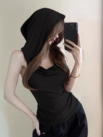 Cloak yourself in minimalist mystery with this hooded statement layer
