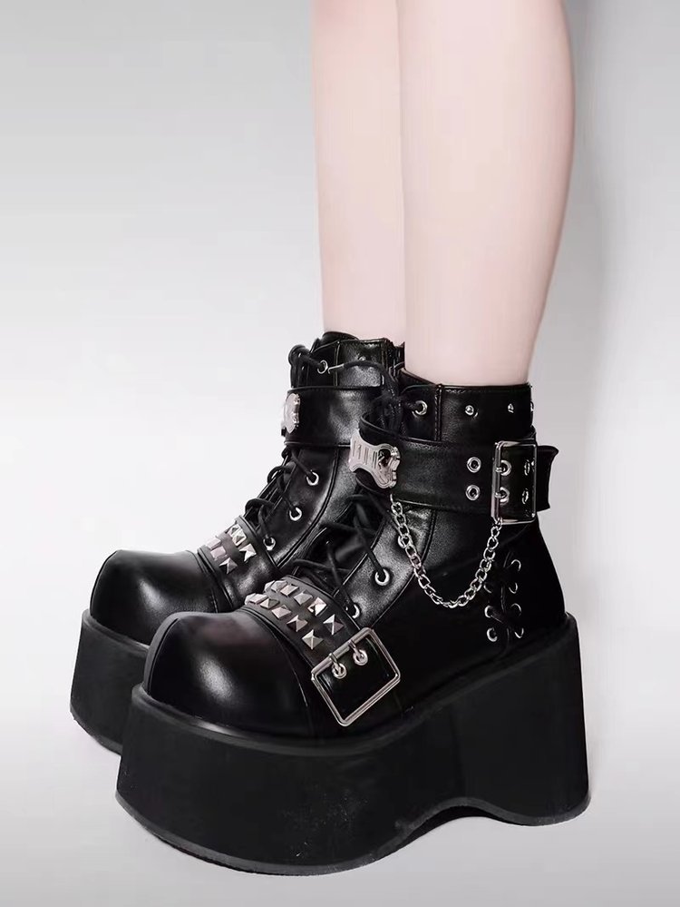 Black_platform_boot_strap_stud_close_up_alternative_fashion_women_hardware_detail