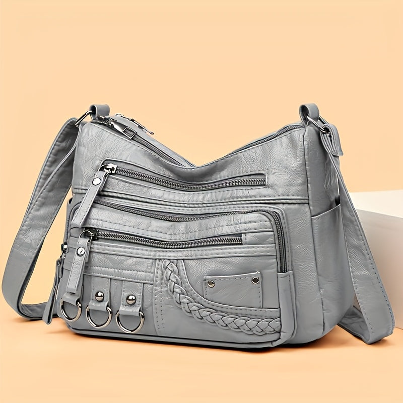 Grey: Multi-pocket quilted PU shoulder bag in grey from Alternative Darkwear